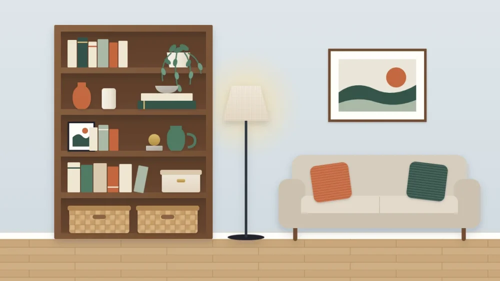 Tall bookcase with books, ceramics and a trailing plant beside a small sofa whose terracotta and green cushions match objects on the shelves