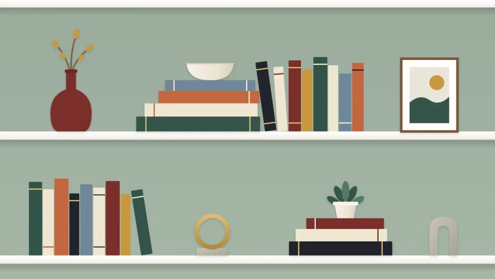 A shelf with a flat stack of four books topped with a small bowl beside an upright row, and a smaller stack with a plant below